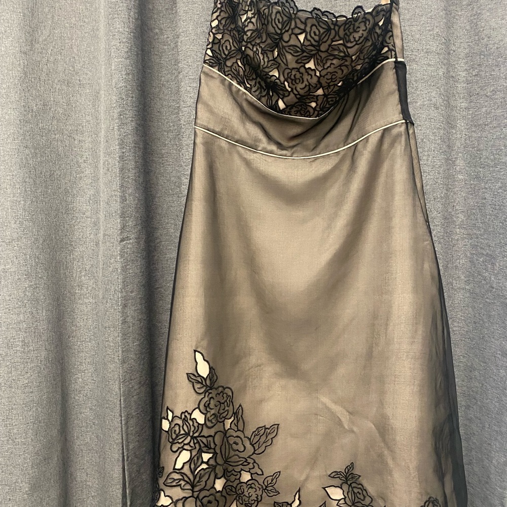 Strapless black dress with floral design